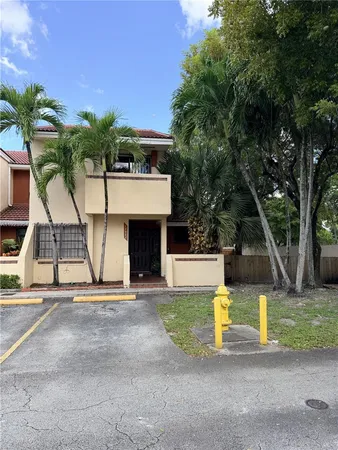a view of a house with a swimming pool