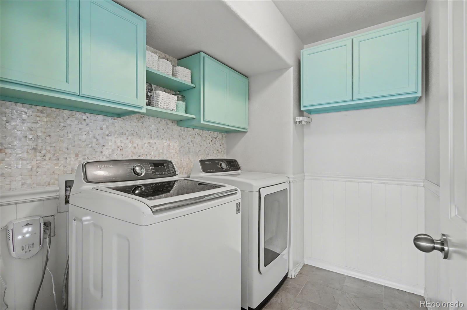 8271 White Fish Way Colorado Springs, CO 80908 - Photo 24 of 47 a view of washer and dryer