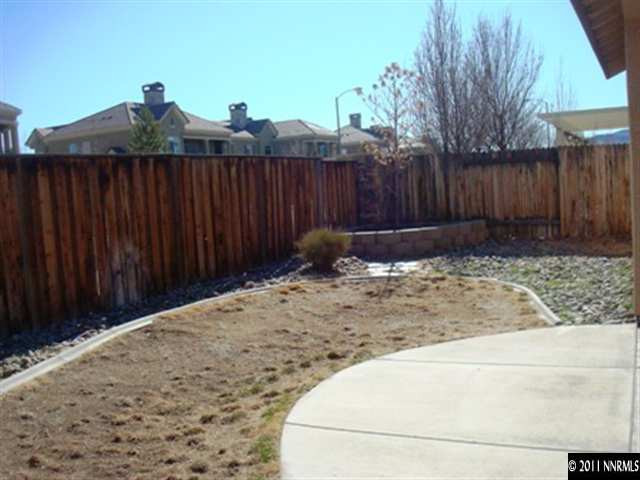 9848 Bridge View Drive Reno, NV 89521 - Photo 12 of 12 a view of a backyard