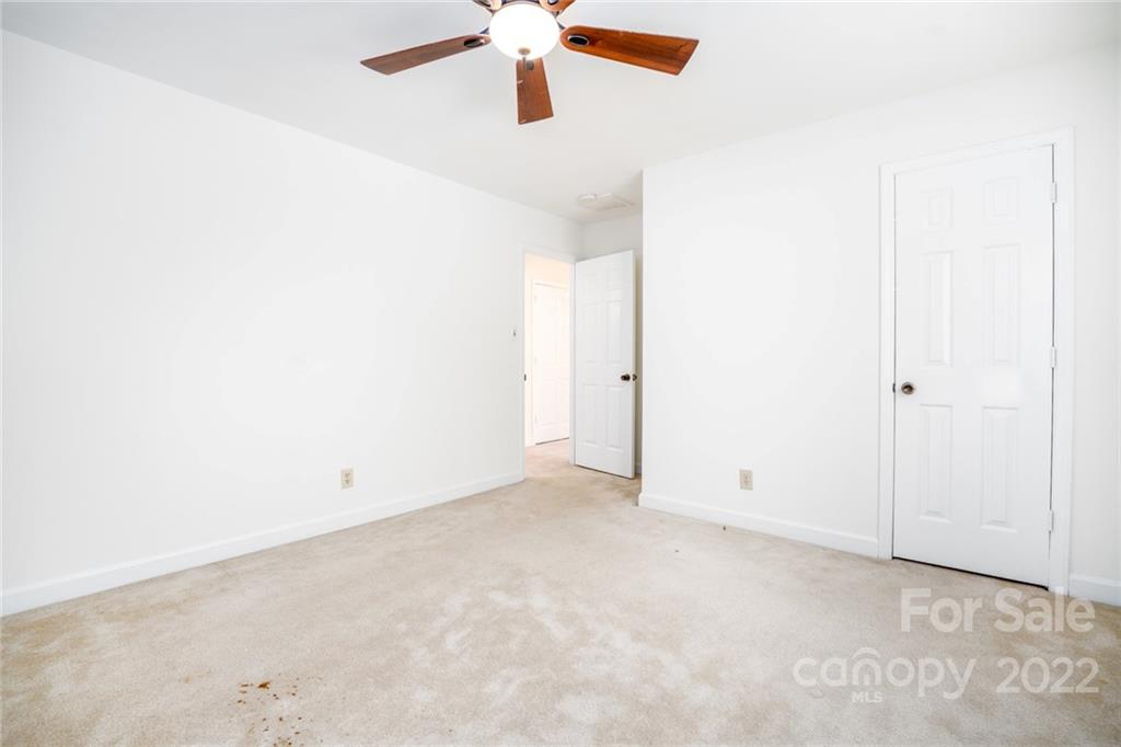 7720 Kinross Drive Oak Ridge, NC 27310 - Photo 19 of 42 a view of an empty room