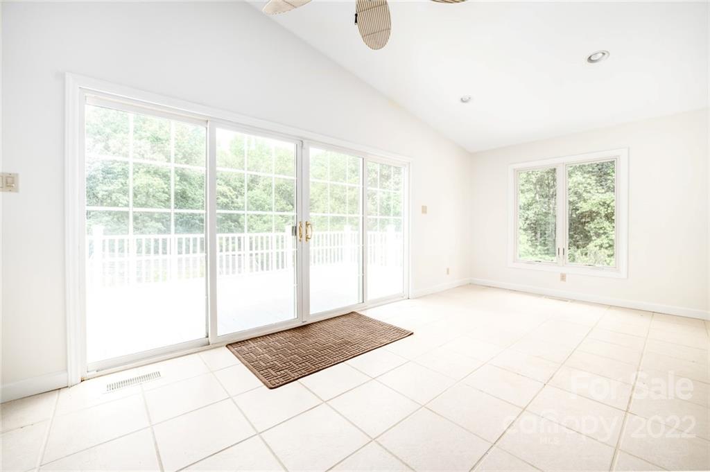 7720 Kinross Drive Oak Ridge, NC 27310 - Photo 29 of 42 a view of an empty room with a window