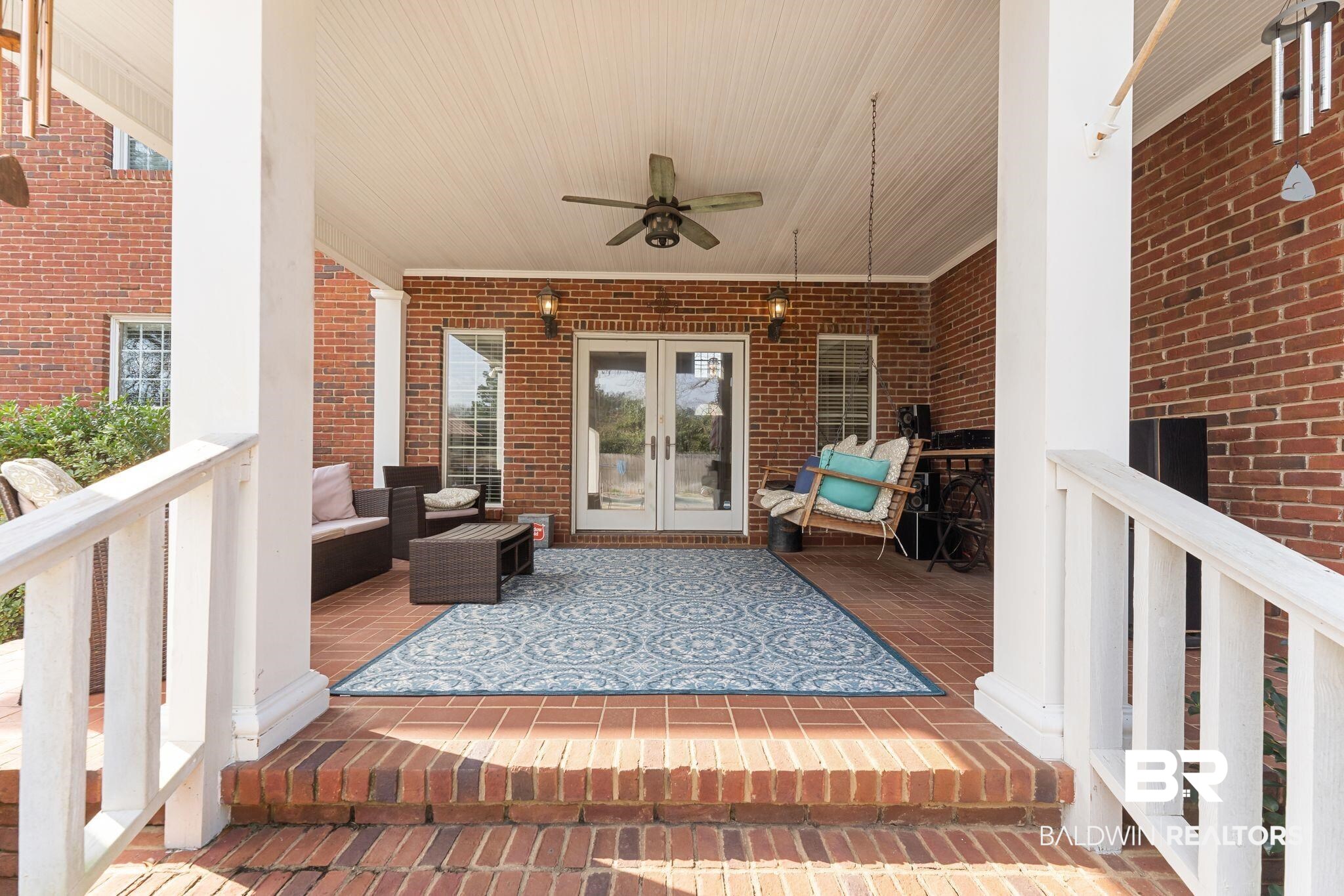 525 Norwood Road Monroeville, AL 36460 - Photo 44 of 55 Wooden deck featuring ceiling fan, french doors, and an outdoor living space