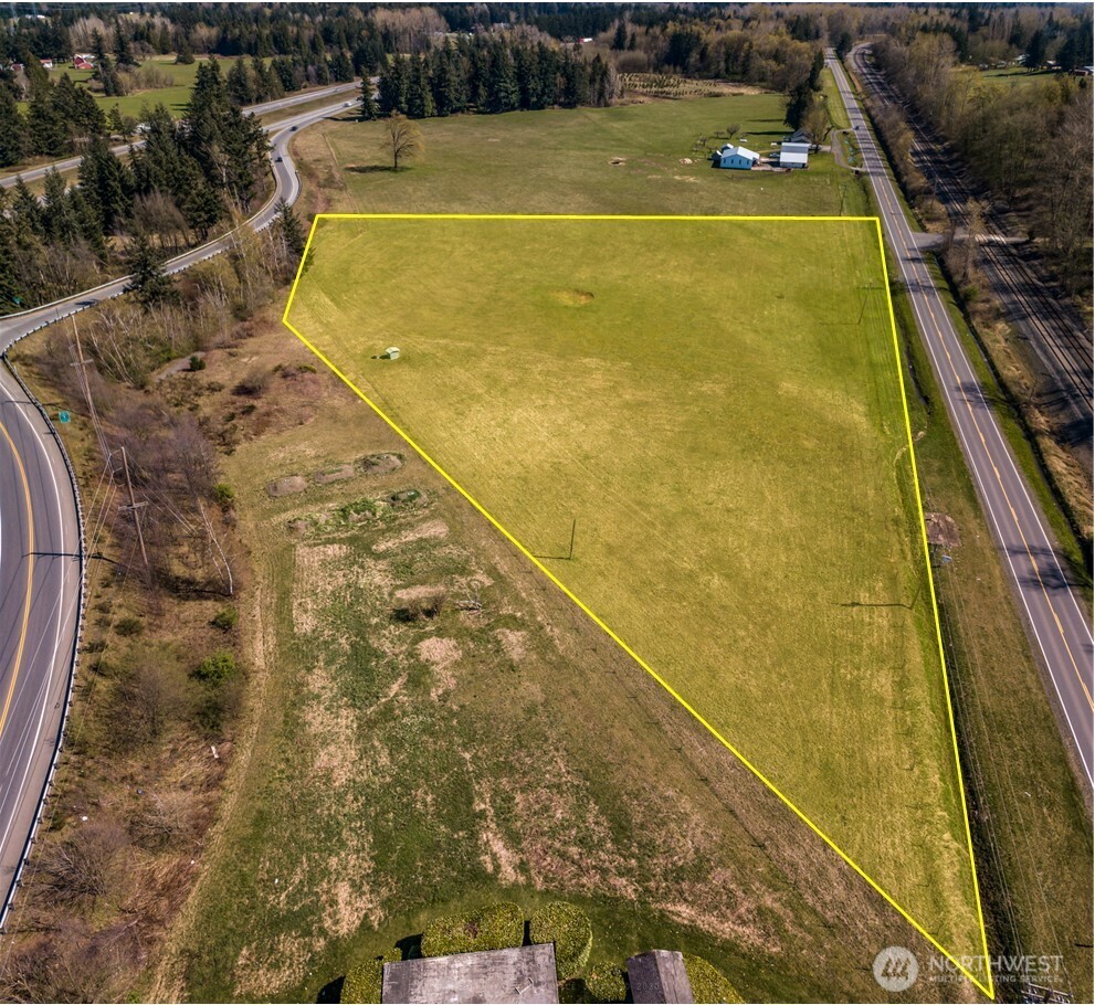 6850 Portal Way Ferndale, WA 98248 - Photo 3 of 10 a view of a swimming pool with an outdoor space