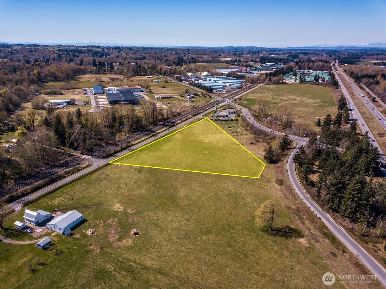 6850 Portal Way Ferndale, WA 98248 - Photo 5 of 10 an aerial view of residential houses with outdoor space