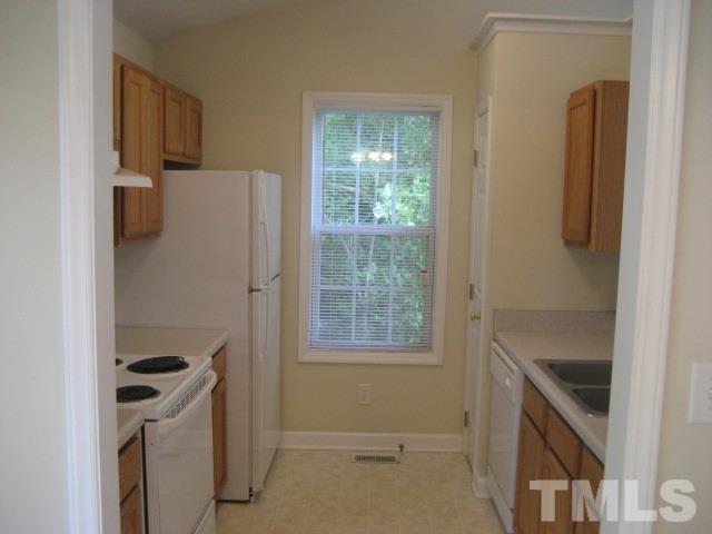 3205 Stedman Drive Raleigh, NC 27607 - Photo 3 of 10 a utility room with dryer and washer