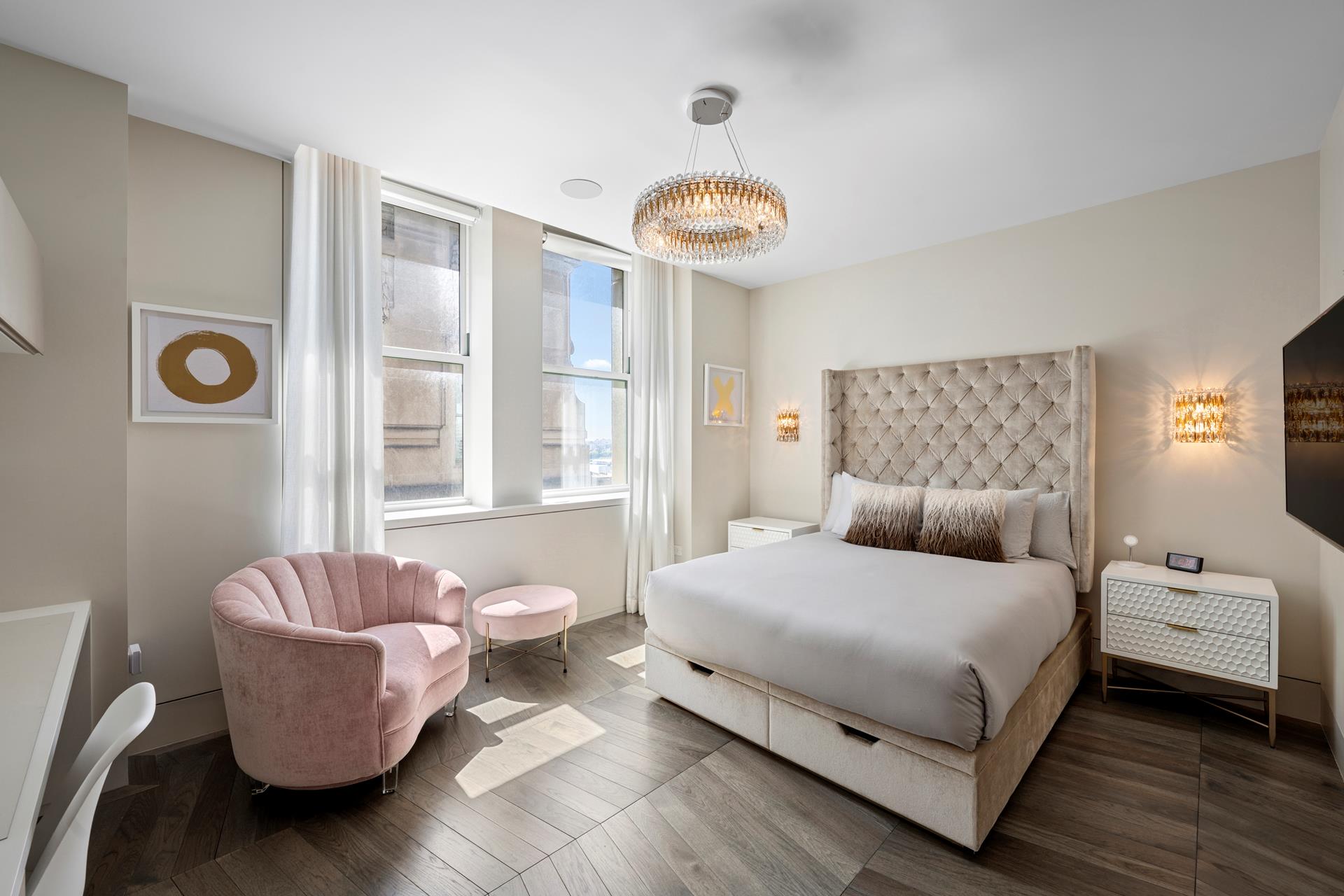 49 Chambers Street, Unit PHB Manhattan, NY 10007 - Photo 10 of 35 a bedroom with a bed and a chair