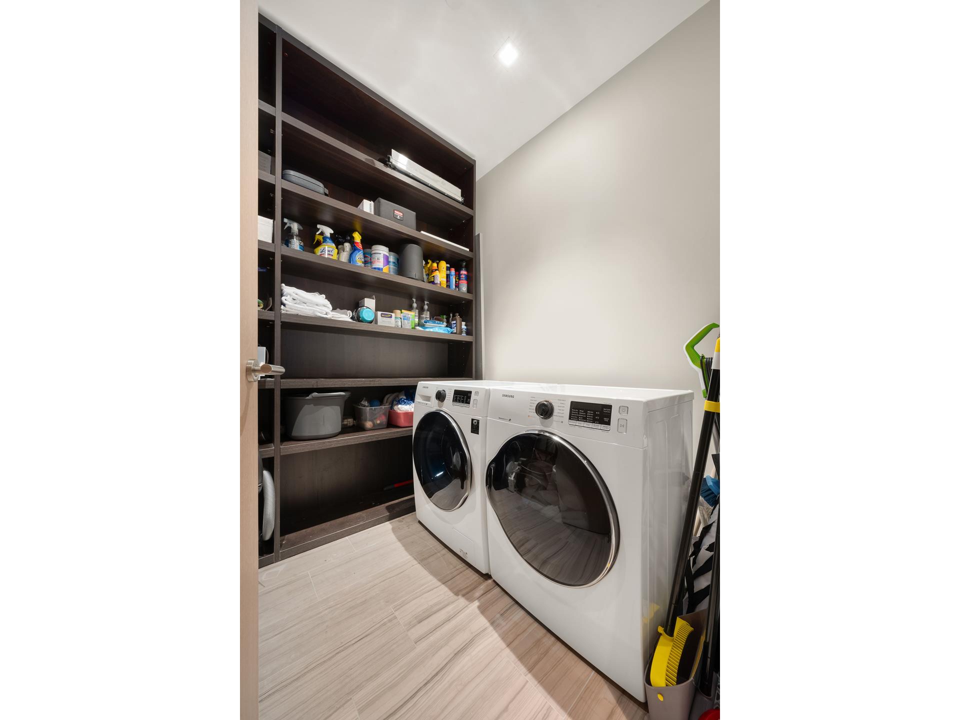 49 Chambers Street, Unit PHB Manhattan, NY 10007 - Photo 16 of 35 a view of livingroom with washer and dryer