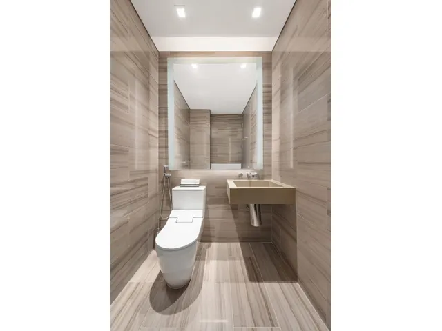 a kitchen with a sink and a refrigerator