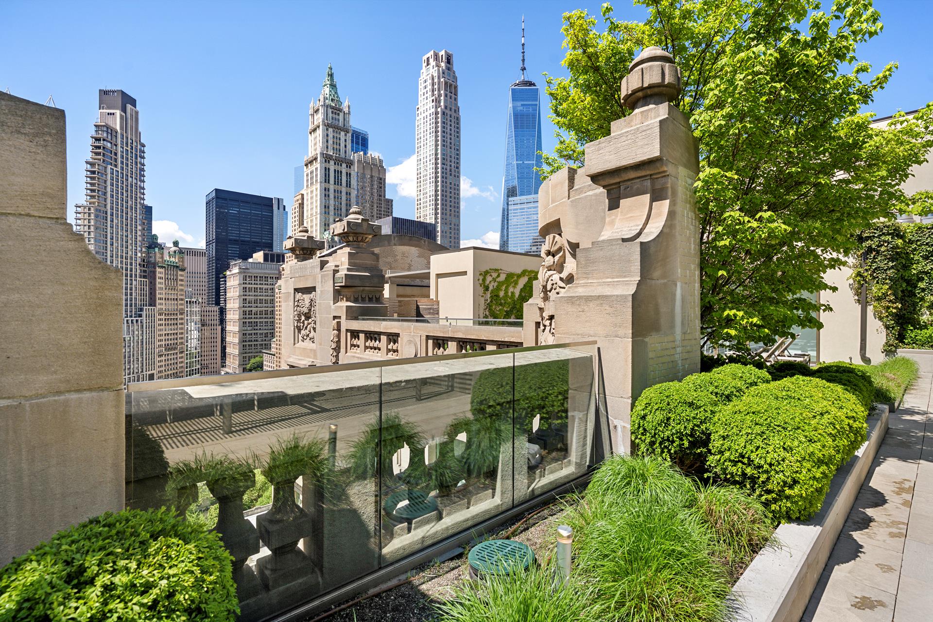 49 Chambers Street, Unit PHB Manhattan, NY 10007 - Photo 22 of 35 a front view of a building with glass windows