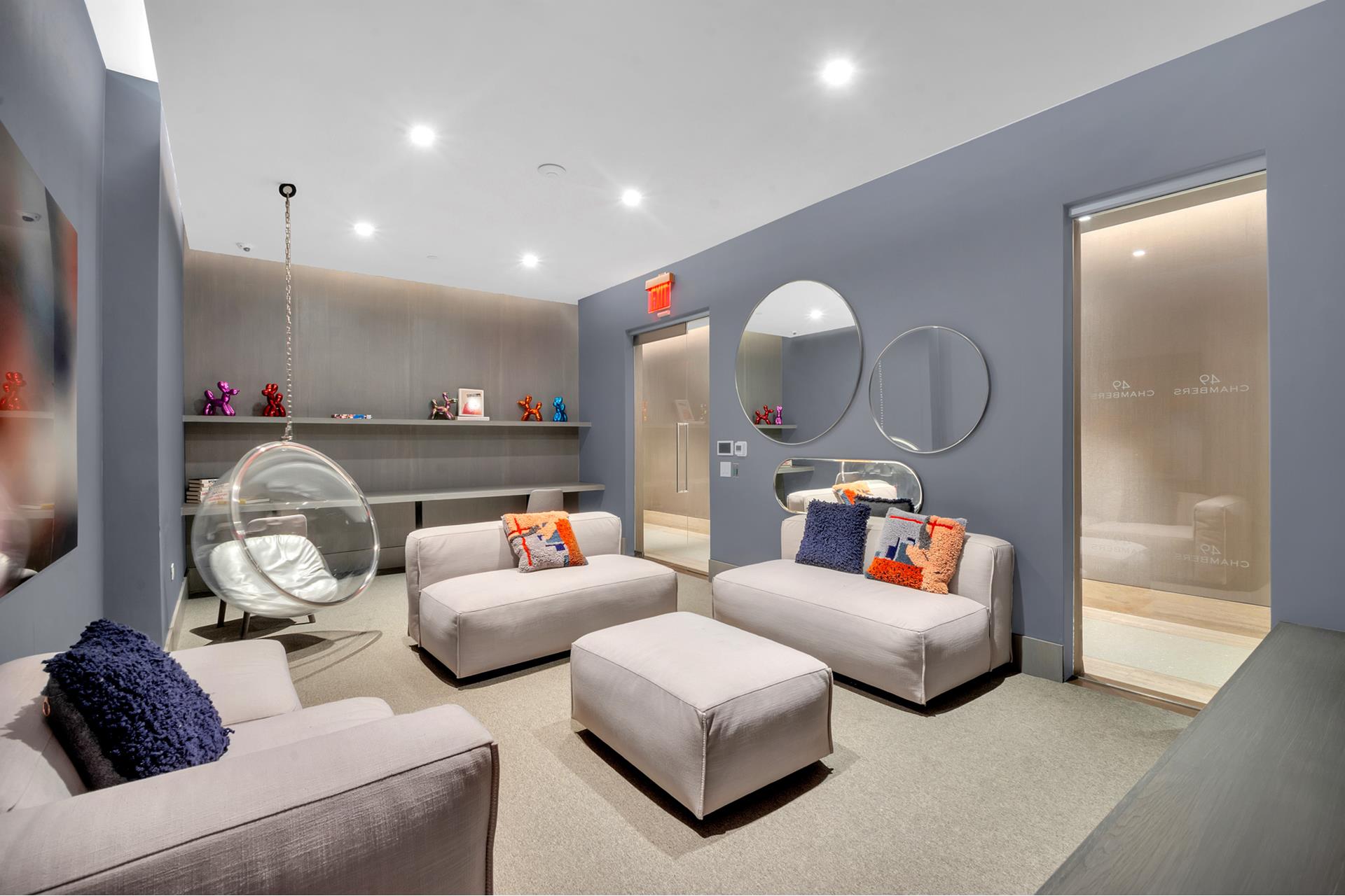 49 Chambers Street, Unit PHB Manhattan, NY 10007 - Photo 24 of 35 a living room with furniture and a mirror