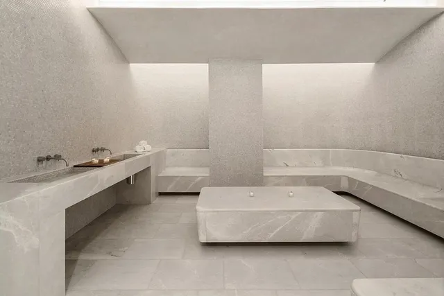 a view of balcony with wooden floor