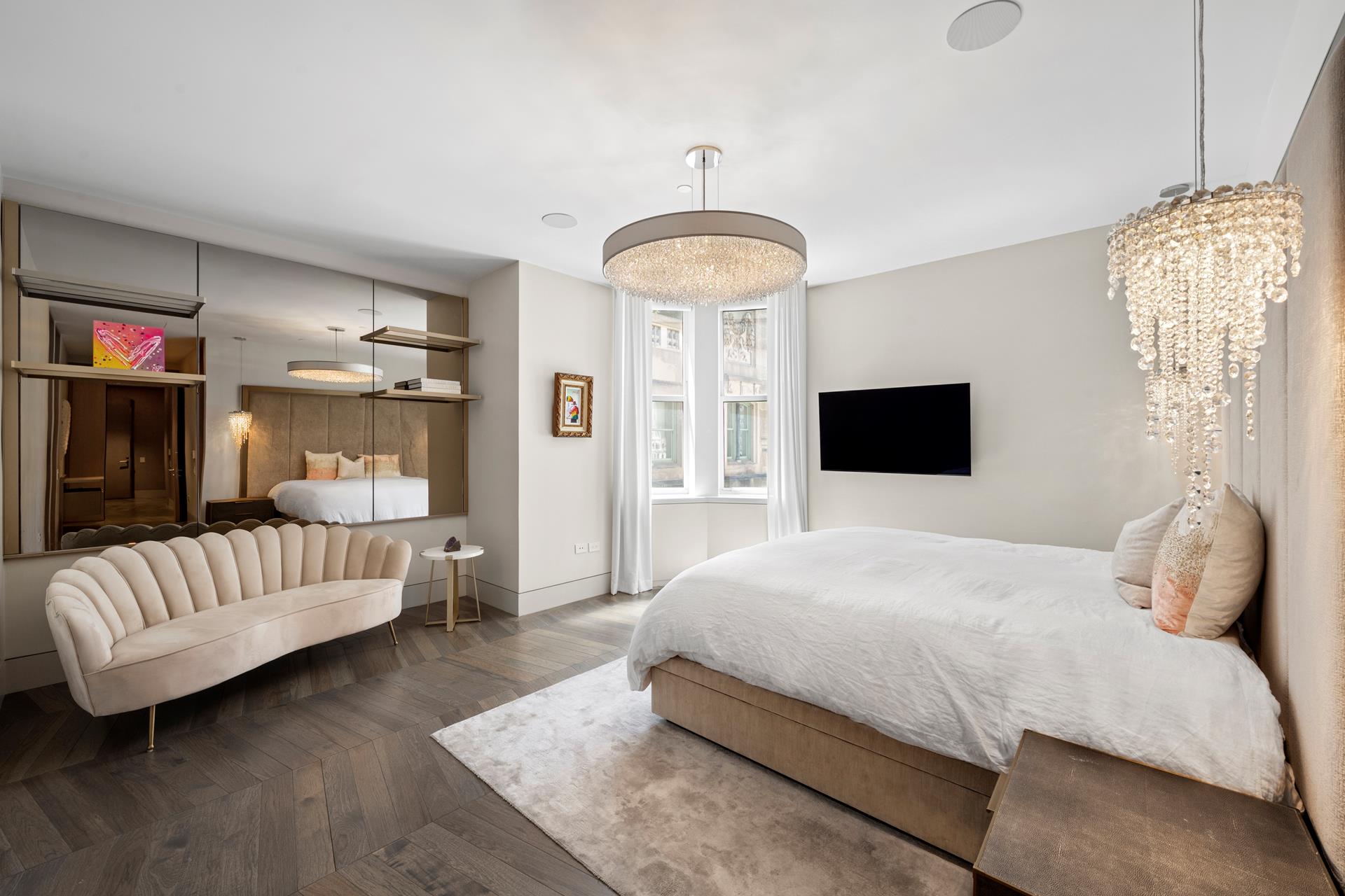 49 Chambers Street, Unit PHB Manhattan, NY 10007 - Photo 8 of 35 a bedroom with a bed and a couch