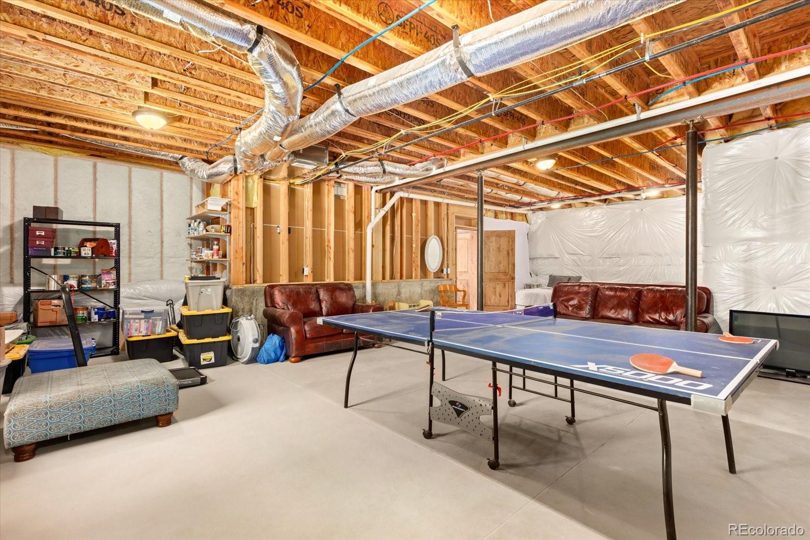 990 Hamilton Creek Road Coaldale, CO 81222 - Photo 29 of 49 a view of a room with gym equipment