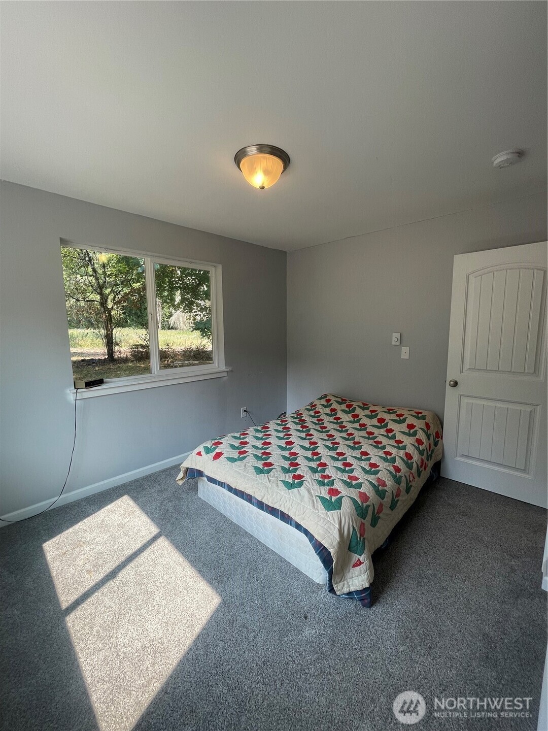 397 Bunker Road Chehalis, WA 98532 - Photo 16 of 35 a bedroom with a bed and window