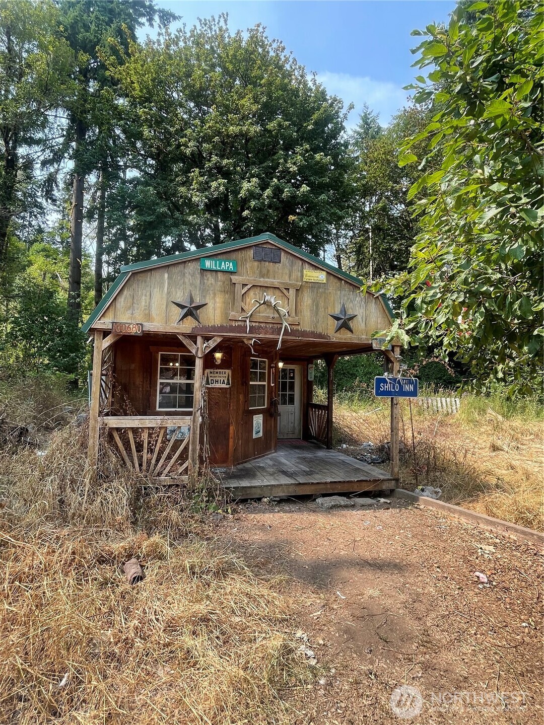 397 Bunker Road Chehalis, WA 98532 - Photo 25 of 35 a view of a wooden house with large trees