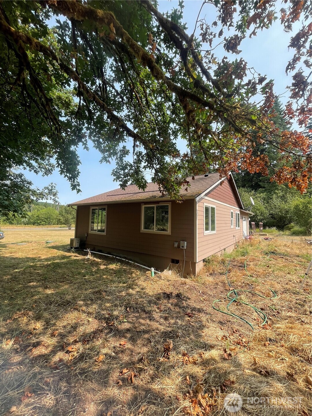 397 Bunker Road Chehalis, WA 98532 - Photo 4 of 35 a house with trees in the background