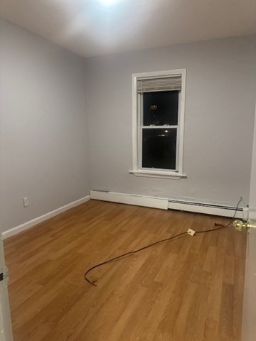 166 A Chelsea Street, Unit 1 Boston, MA 02128 - Photo 11 of 13 a view of an empty room with a window