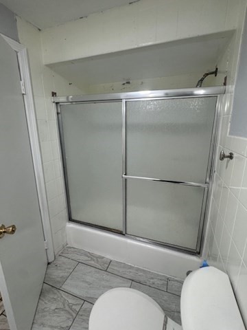 166 A Chelsea Street, Unit 1 Boston, MA 02128 - Photo 8 of 13 a bathroom with a toilet and a shower