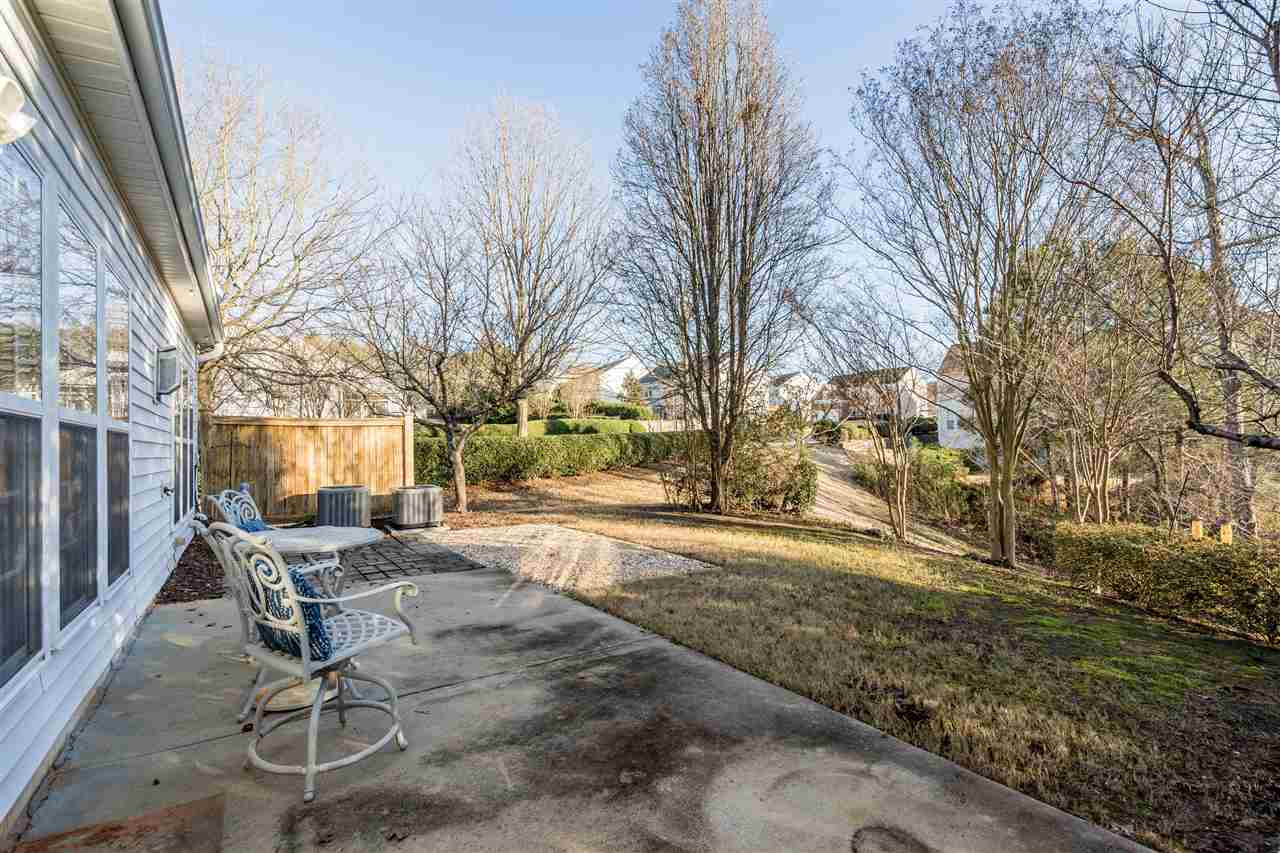5405 Brandy Bay Road Raleigh, NC 27613 - Photo 21 of 23 Huge outdoor patio for relaxing & entertaining! In the spring & summer the surrounding trees are extra beautiful. Patio