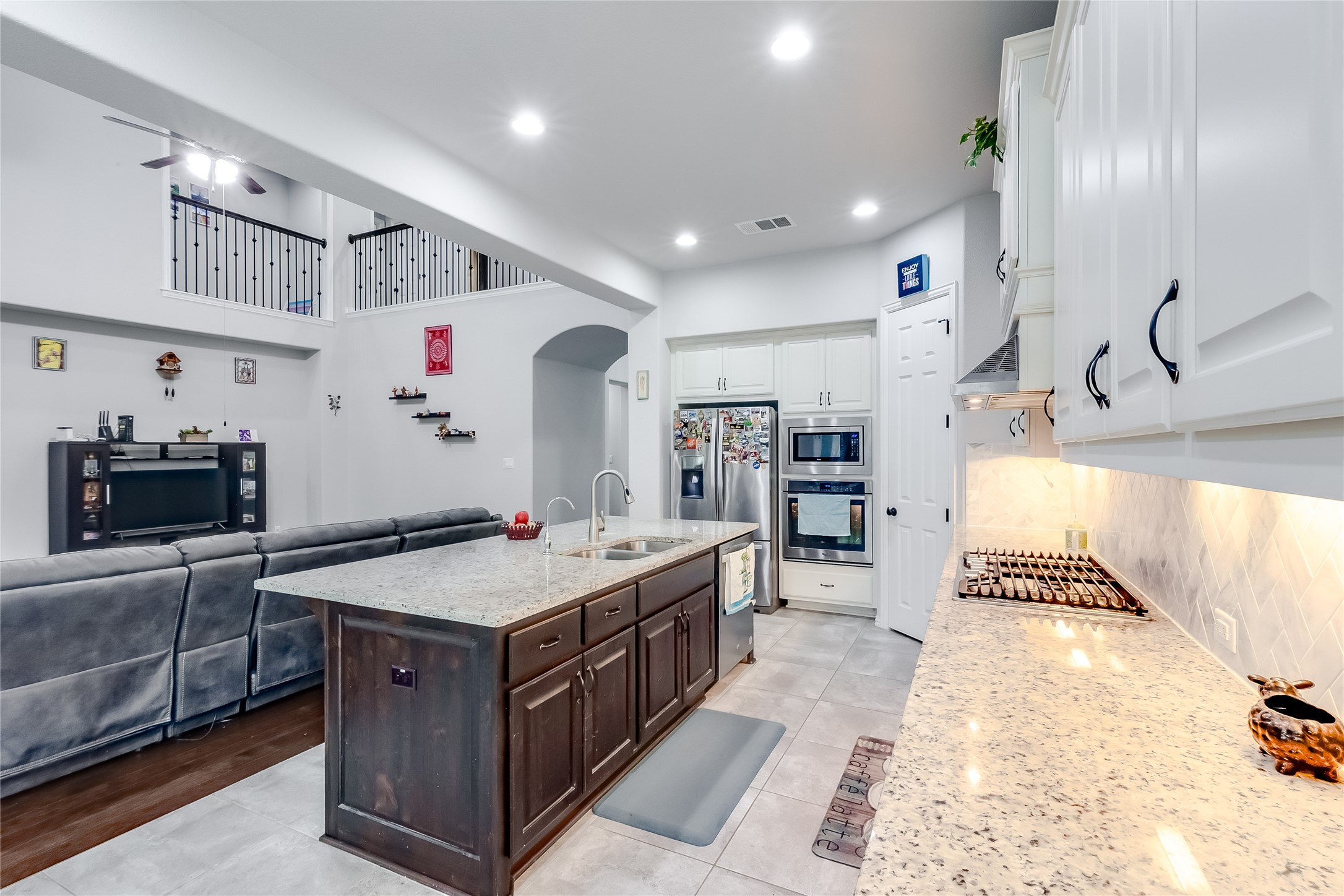 204 Lady Bird Lane Georgetown, TX 78628 - Photo 13 of 40 a kitchen with stove and cabinets