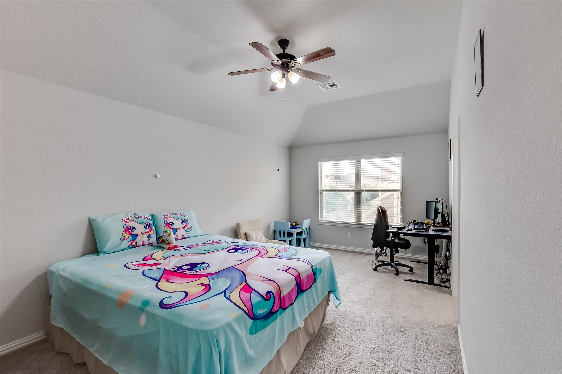 204 Lady Bird Lane Georgetown, TX 78628 - Photo 25 of 40 a bedroom with a bed and a large window