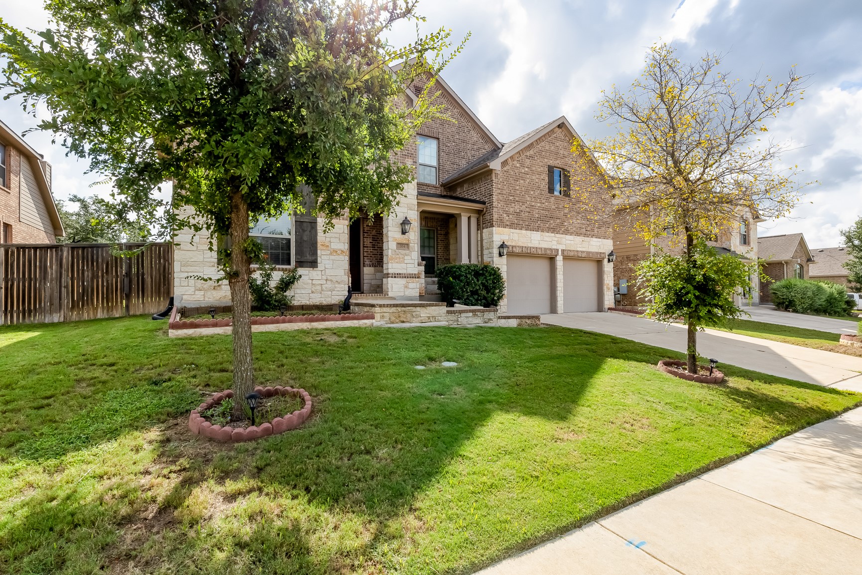 204 Lady Bird Lane Georgetown, TX 78628 - Photo 3 of 40 a view of a house with backyard and sitting area