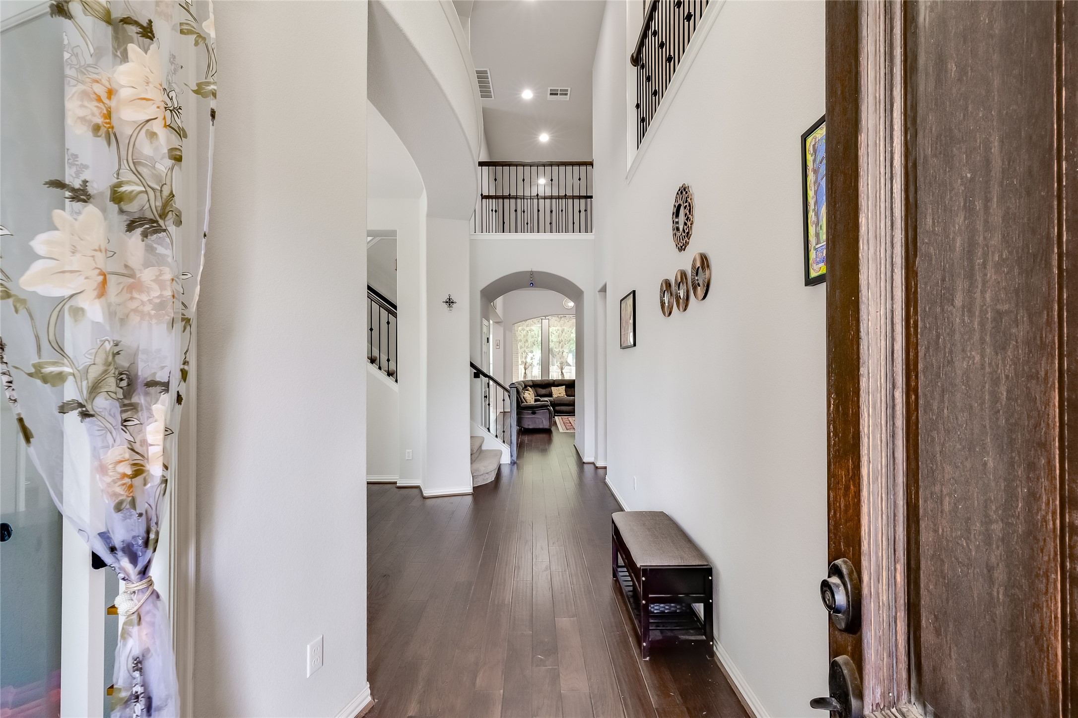 204 Lady Bird Lane Georgetown, TX 78628 - Photo 5 of 40 a view of entryway and hall with wooden floor
