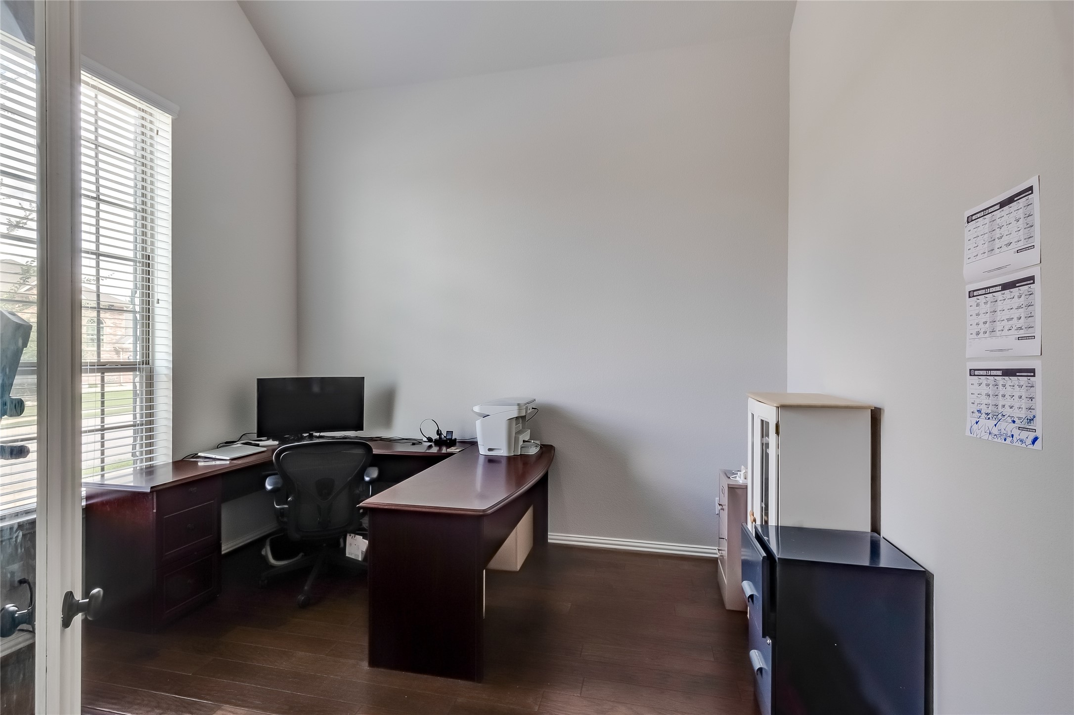 204 Lady Bird Lane Georgetown, TX 78628 - Photo 6 of 40 a view of a workspace with furniture and a window