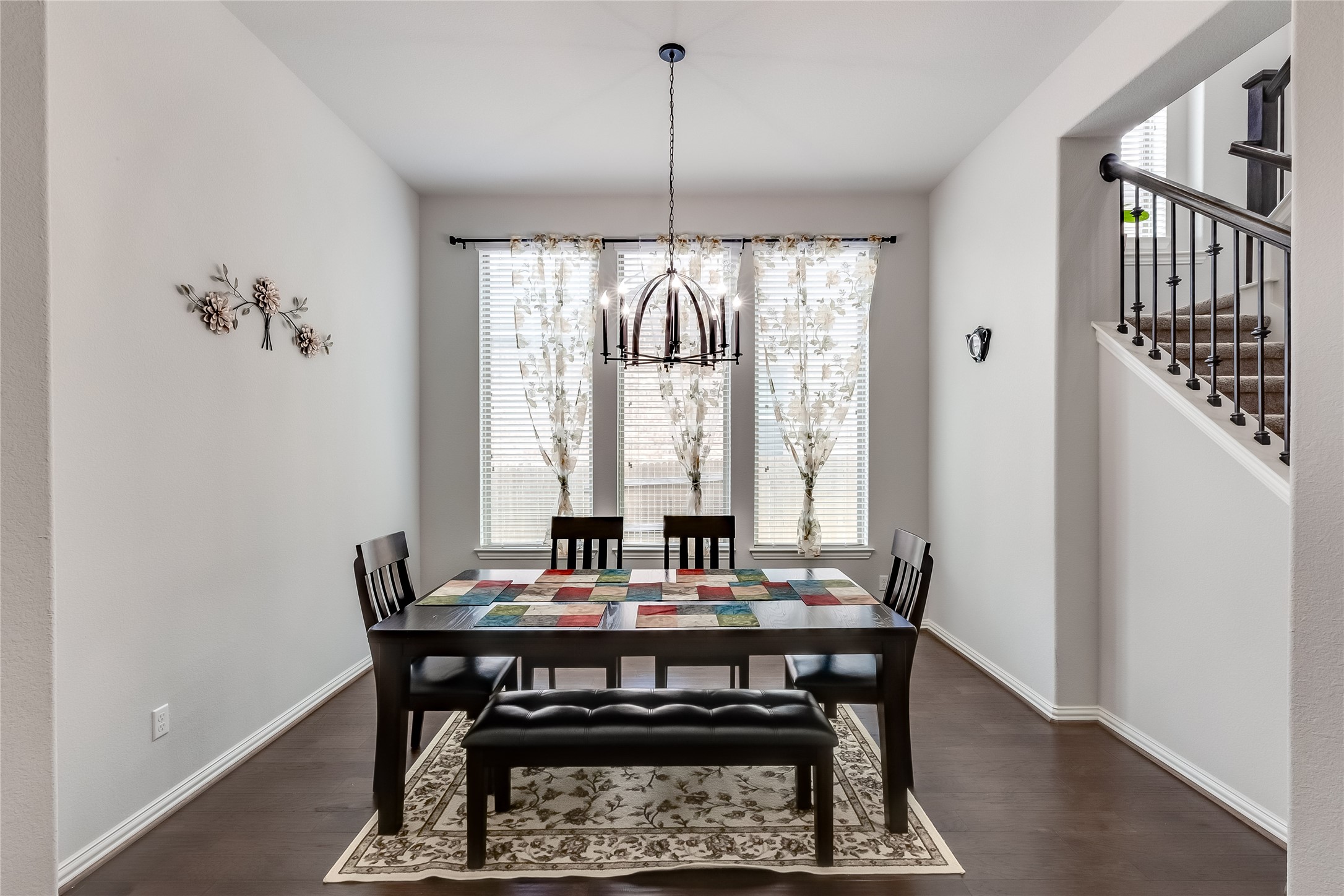 204 Lady Bird Lane Georgetown, TX 78628 - Photo 7 of 40 a view of a dining room with furniture window and wooden floor
