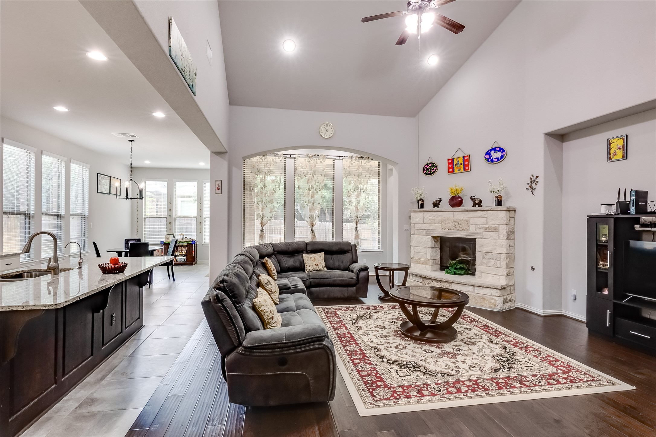 204 Lady Bird Lane Georgetown, TX 78628 - Photo 8 of 40 a living room with furniture and a fireplace