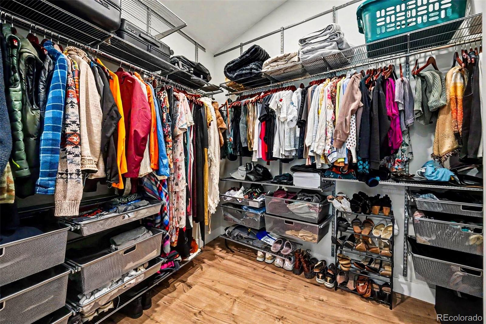 7231 Timber Trail Road Evergreen, CO 80439 - Photo 25 of 35 a view of walk in closet with clothes and shoes