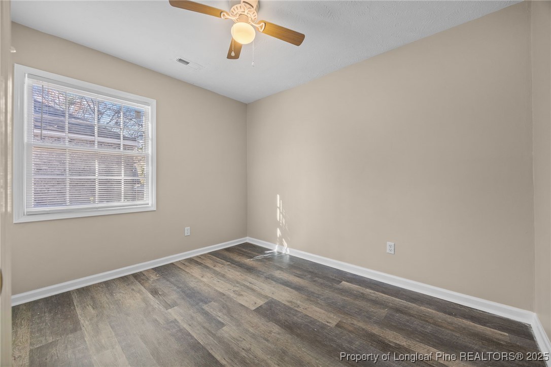 735 Ashbrook Road Fayetteville, NC 28314 - Photo 14 of 39 an empty room with a window