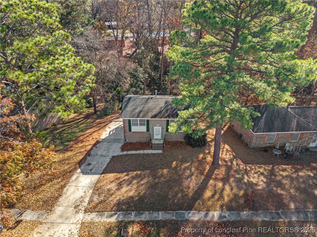 735 Ashbrook Road Fayetteville, NC 28314 - Photo 5 of 39 a view of a backyard with sitting area