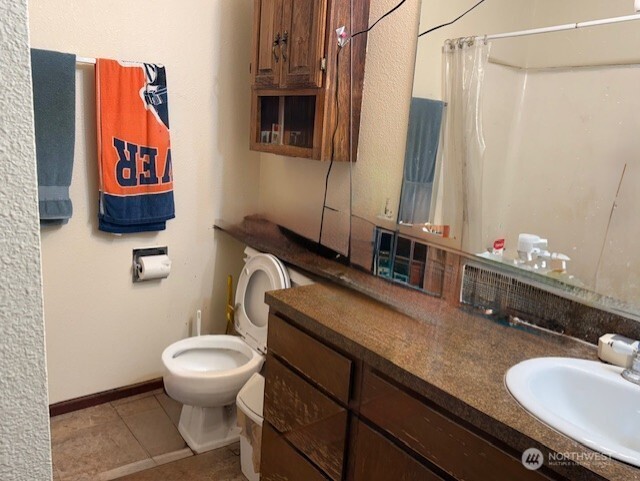 1 Lake Louise Drive, Unit 42 Bellingham, WA 98229 - Photo 13 of 21 a bathroom with a sink mirror vanity and toilet