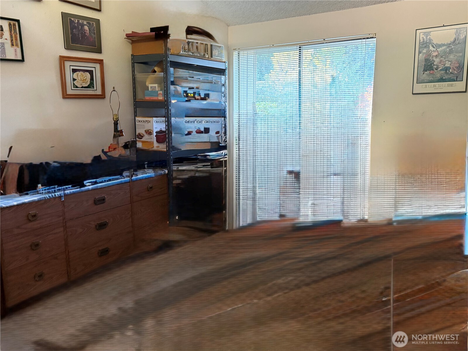 1 Lake Louise Drive, Unit 42 Bellingham, WA 98229 - Photo 15 of 21 a kitchen with cabinets wooden floor and stainless steel appliances