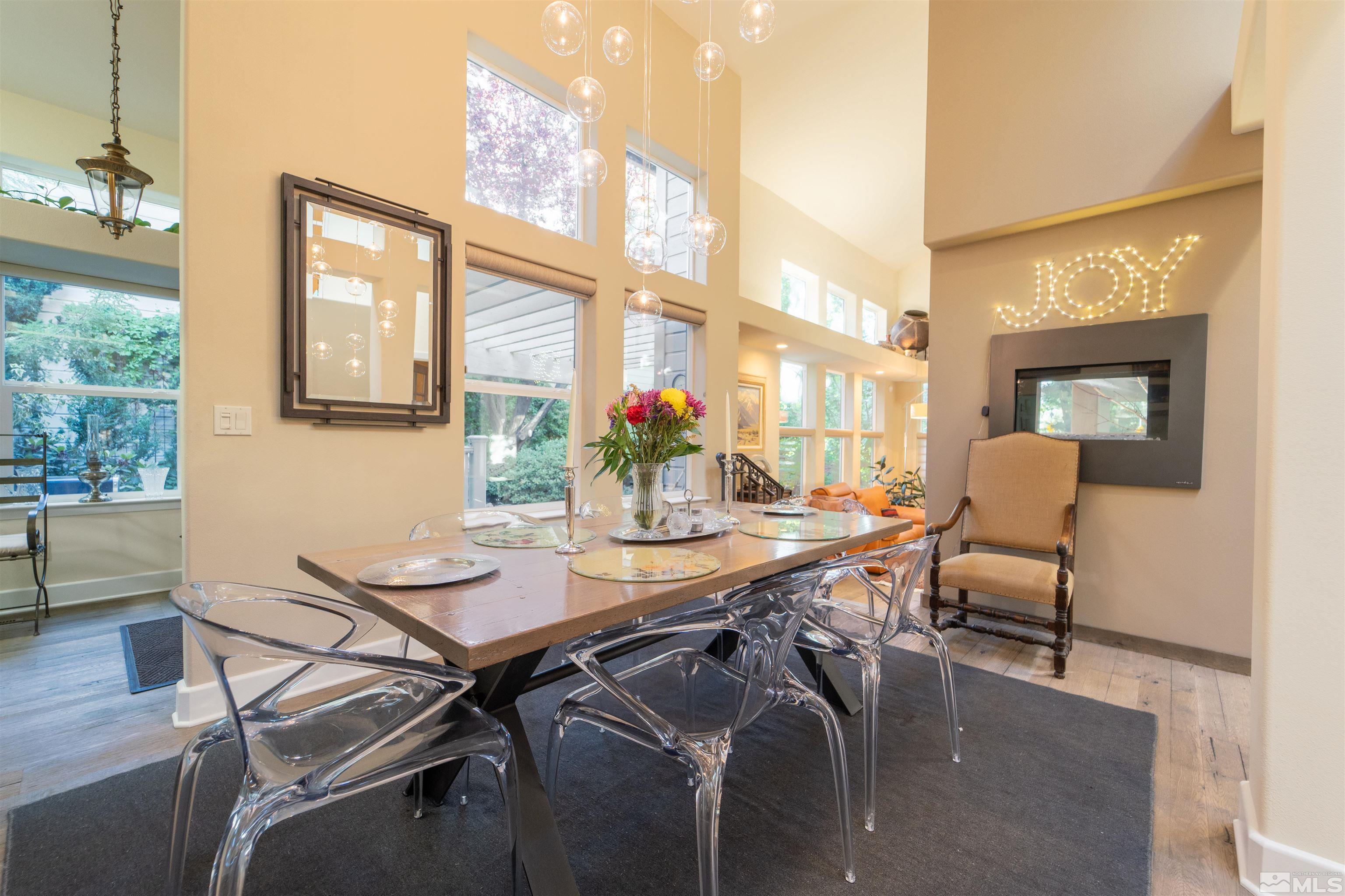 3925 Caughlin Creek Road Reno, NV 89519 - Photo 8 of 38 a view of a dining room with furniture window and wooden floor