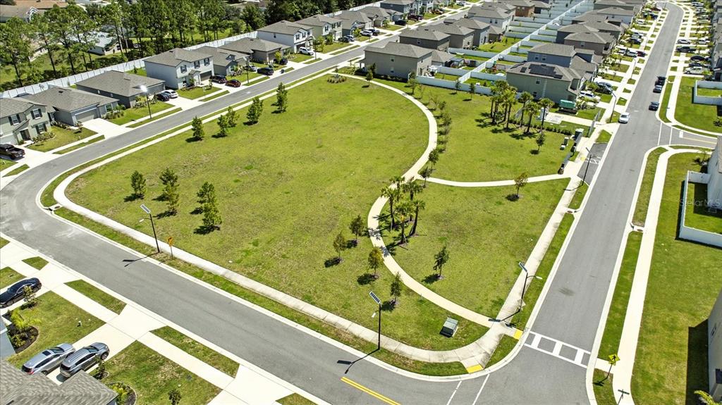 73 Rain Lily Ave Spring Hill Spring Hill, FL 34609 - Photo 35 of 37 an aerial view of a swimming pool