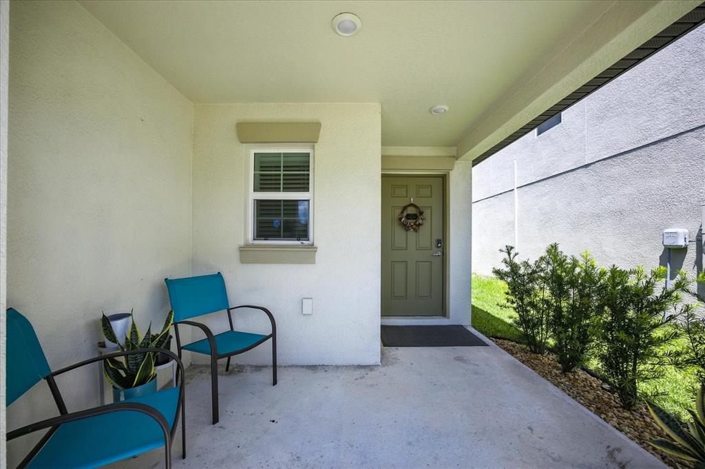 73 Rain Lily Ave Spring Hill Spring Hill, FL 34609 - Photo 5 of 37 a house view with a seating space
