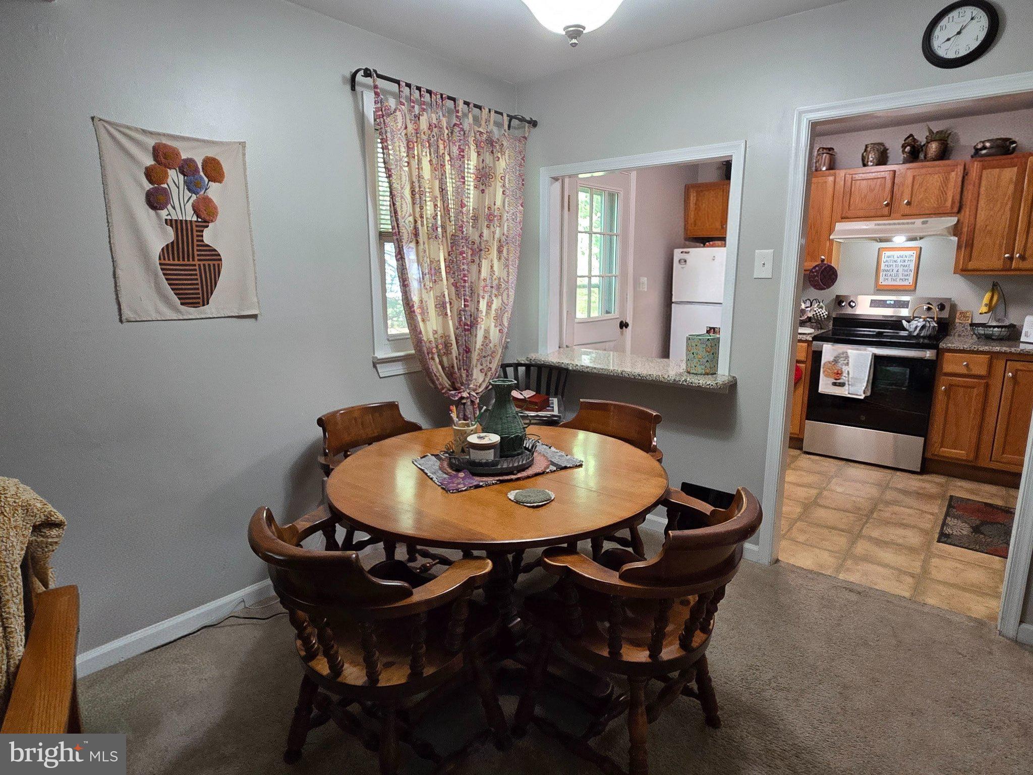 178 Elephant Road, Unit B13 Dublin, PA 18917 - Photo 5 of 21 Cozy dining nook with warm ambiance.