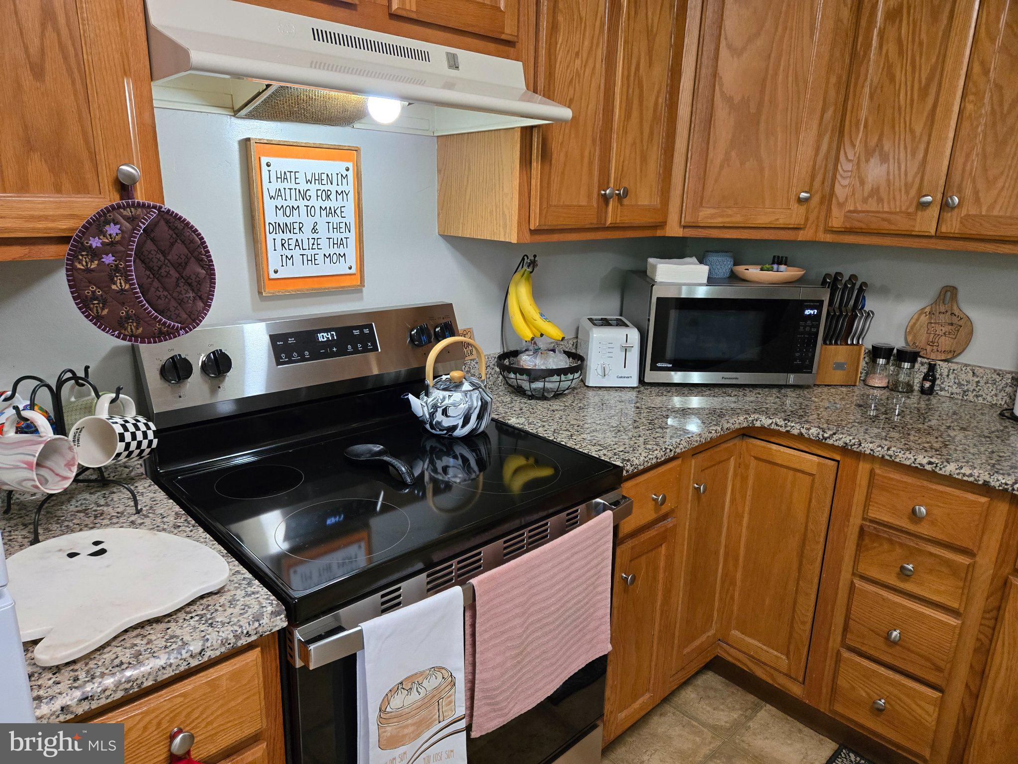 178 Elephant Road, Unit B13 Dublin, PA 18917 - Photo 8 of 21 Charming kitchen with warm wood tones.
