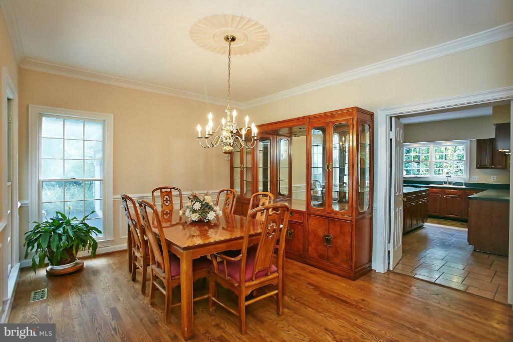 5500 Granby Road Derwood, MD 20855 - Photo 8 of 30 Dining Room with floor to ceiling windows