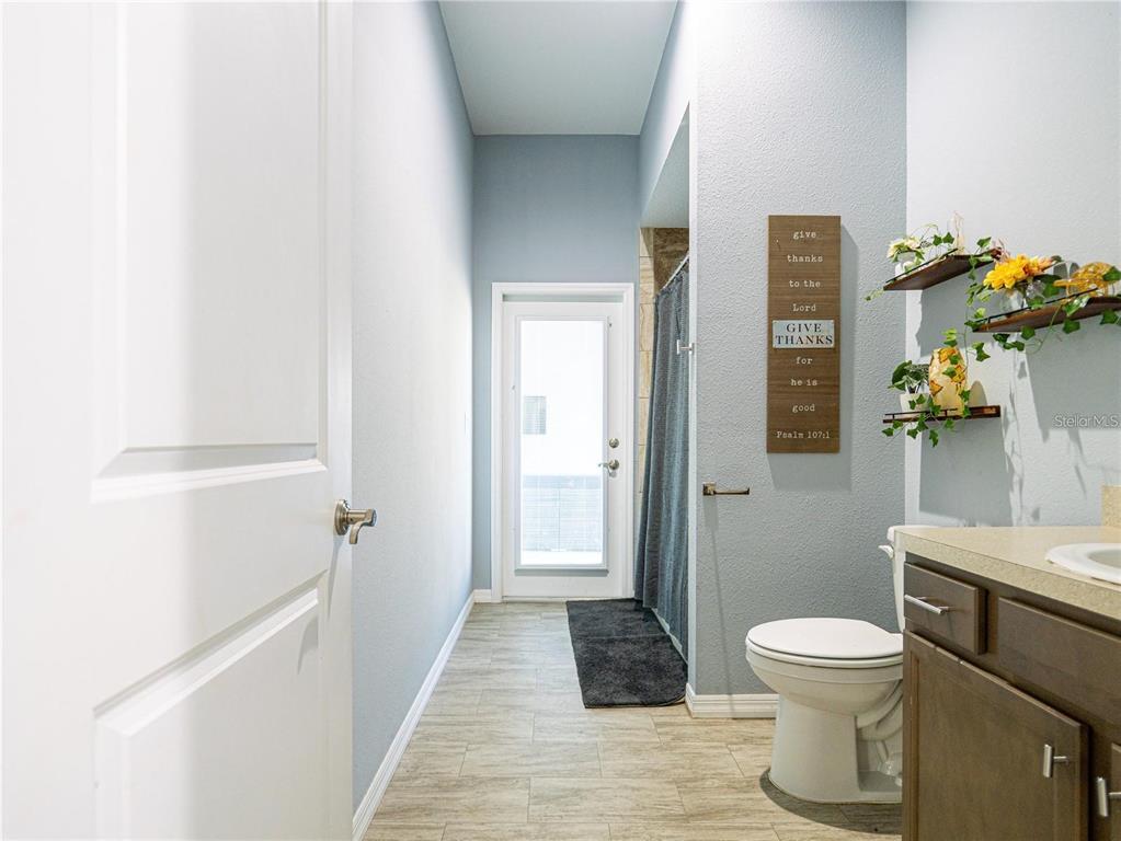 10688 Southwest 129th Terrace Road Dunnellon, FL 34432 - Photo 30 of 35 a bathroom with a toilet and a shower