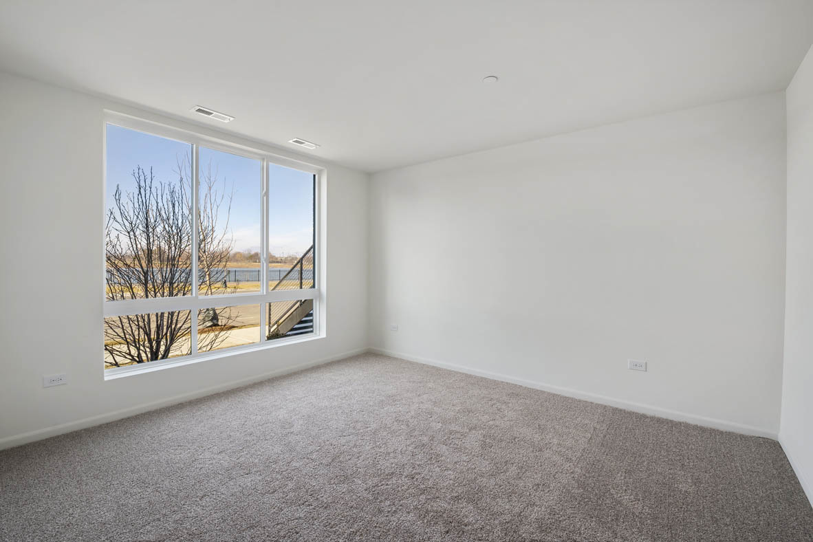 2241 Venture Drive Schaumburg, IL 60173 - Photo 2 of 33 a view of an empty room with a window