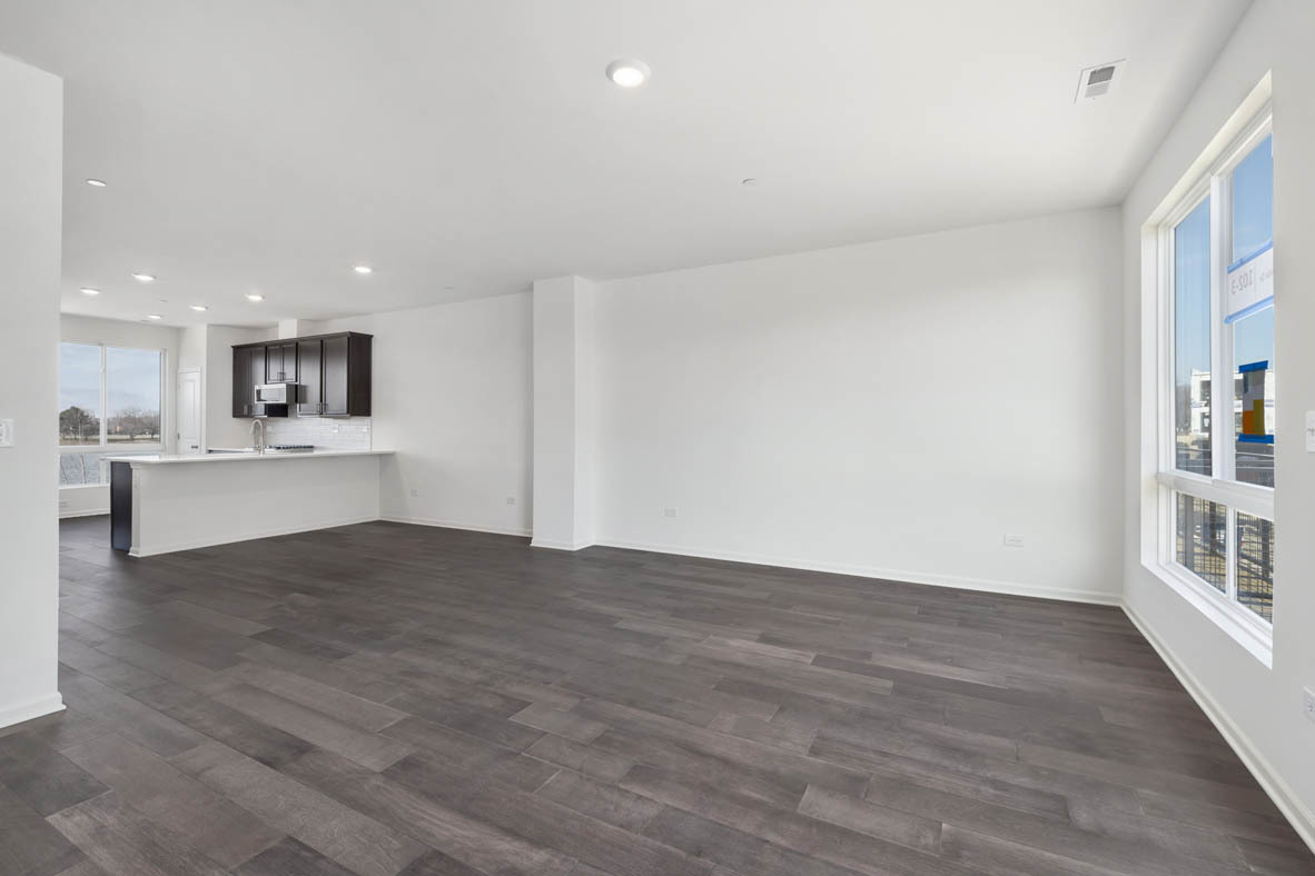 2241 Venture Drive Schaumburg, IL 60173 - Photo 10 of 33 a view of a kitchen with wooden floor and a window