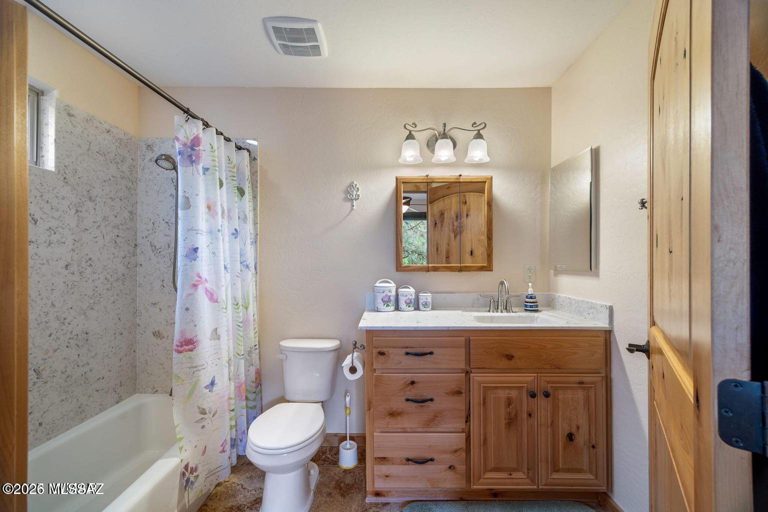 17 2195 Alpine, AZ 85920 - Photo 11 of 48 a bathroom with a sink vanity mirror and toilet