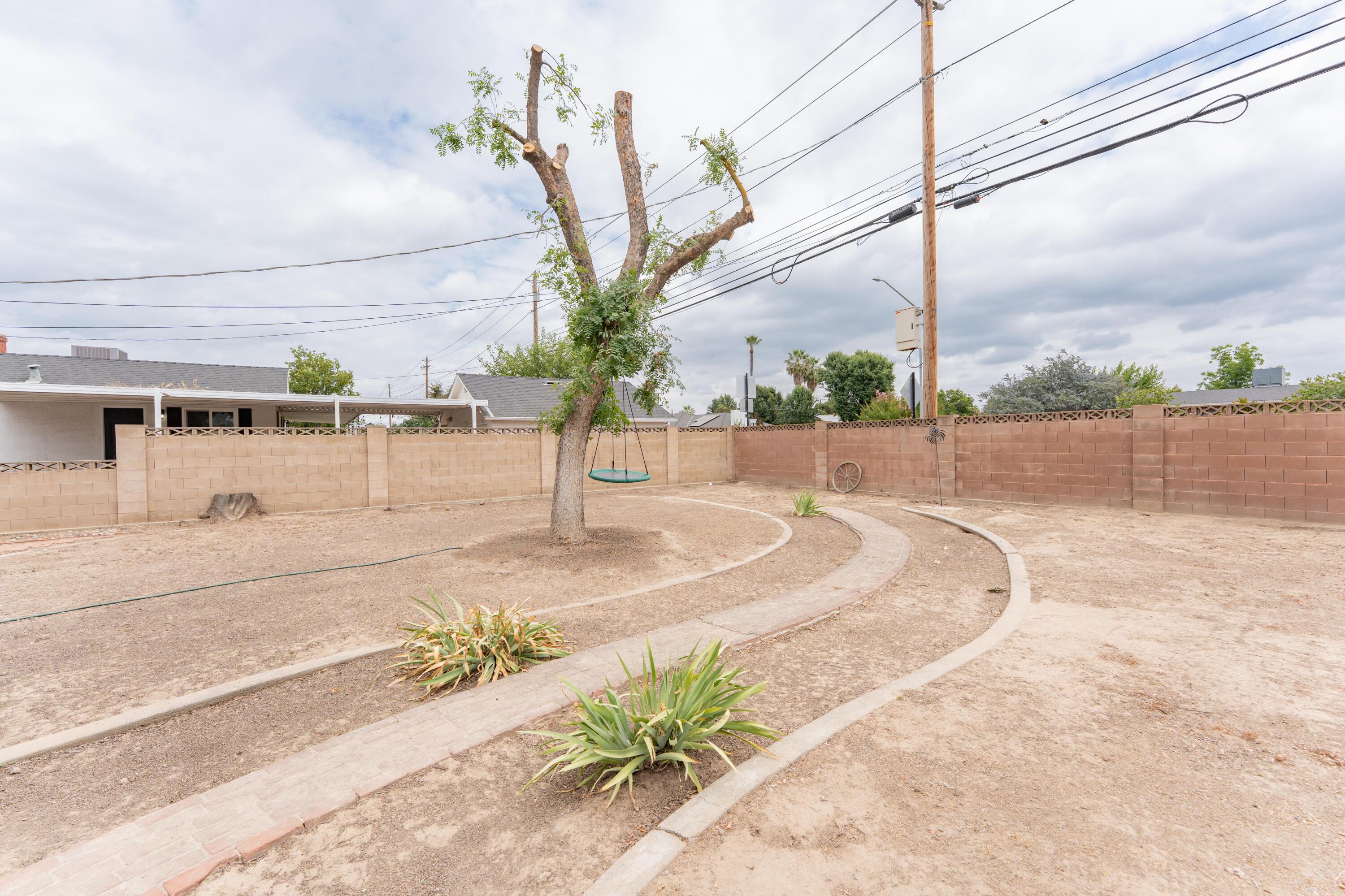 570 North Birch Avenue Reedley, CA 93654 - Photo 43 of 52 a view of a backyard