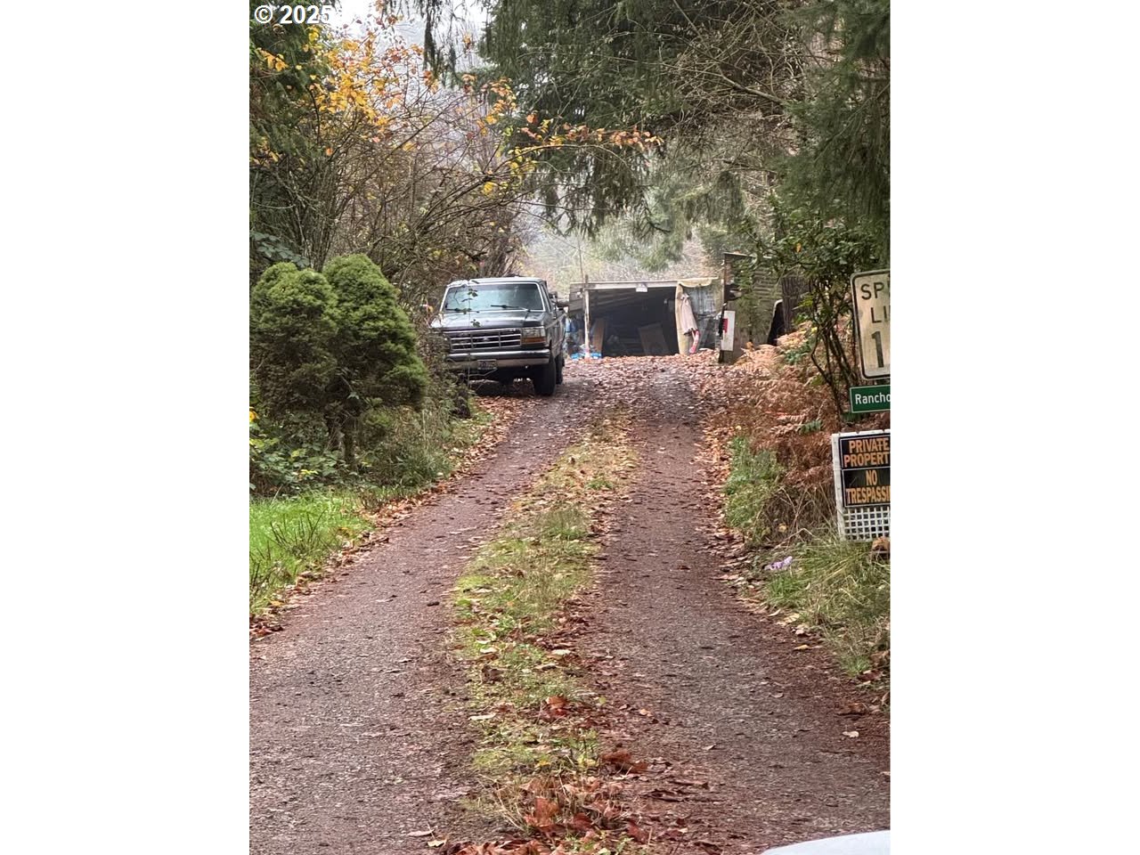 12192 South Mulino Road Canby, OR 97013 - Photo 2 of 23 a backyard of a house with fire pit