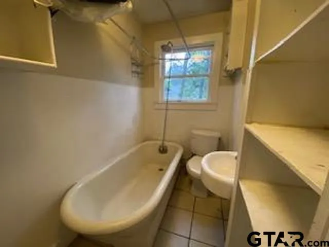 a bathroom with a sink and bathtub