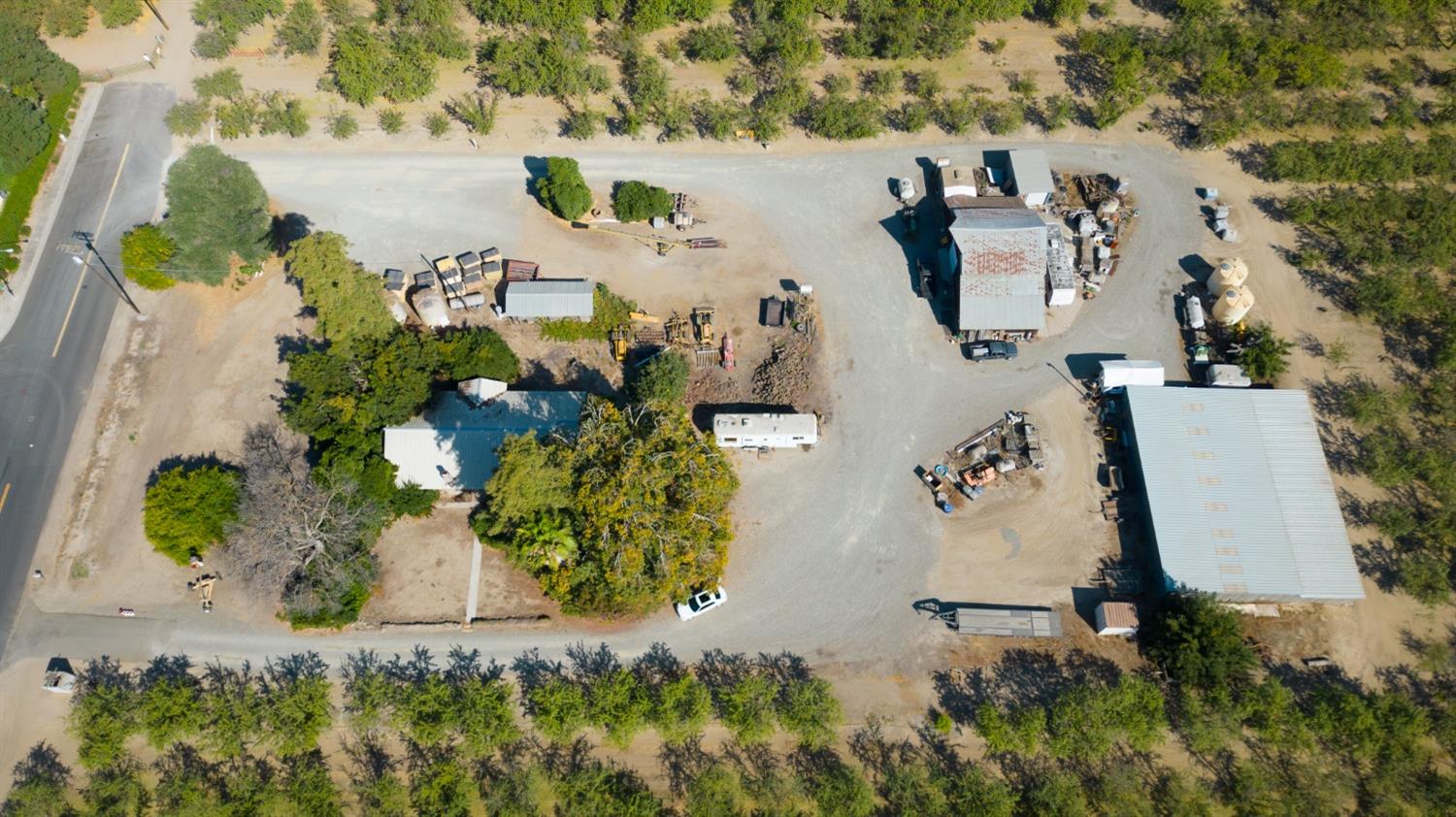 5706 Finney Road Salida, CA 95356 - Photo 11 of 14 an aerial view of a house with a yard and lake view
