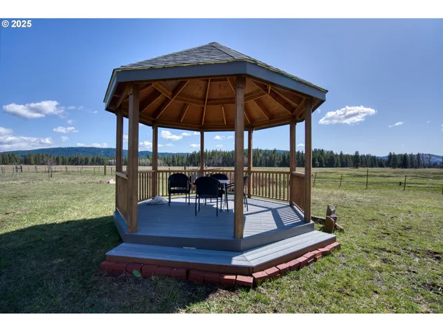 a view of balcony with wooden floor